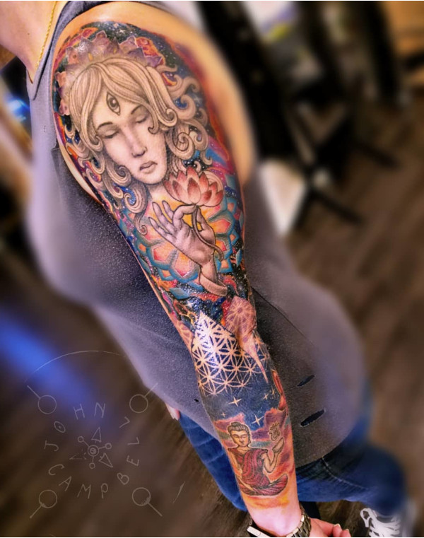 Full color sleeve zen lotus tattoo by John Campbell at Sacred Mandala Studio tattoo parlor in Durham, NC.